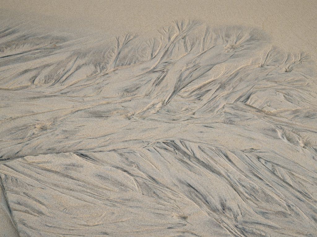 Ojämn sand