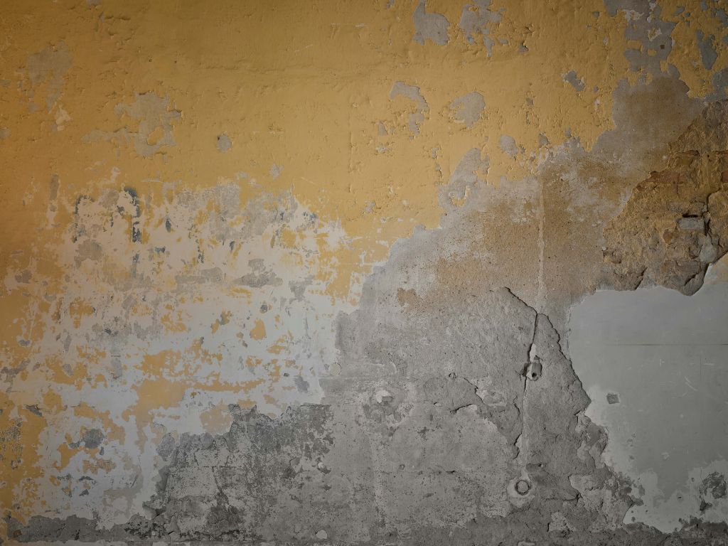 Vittrad gul vägg