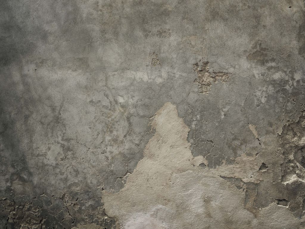 Sprucken betong med stuckatur