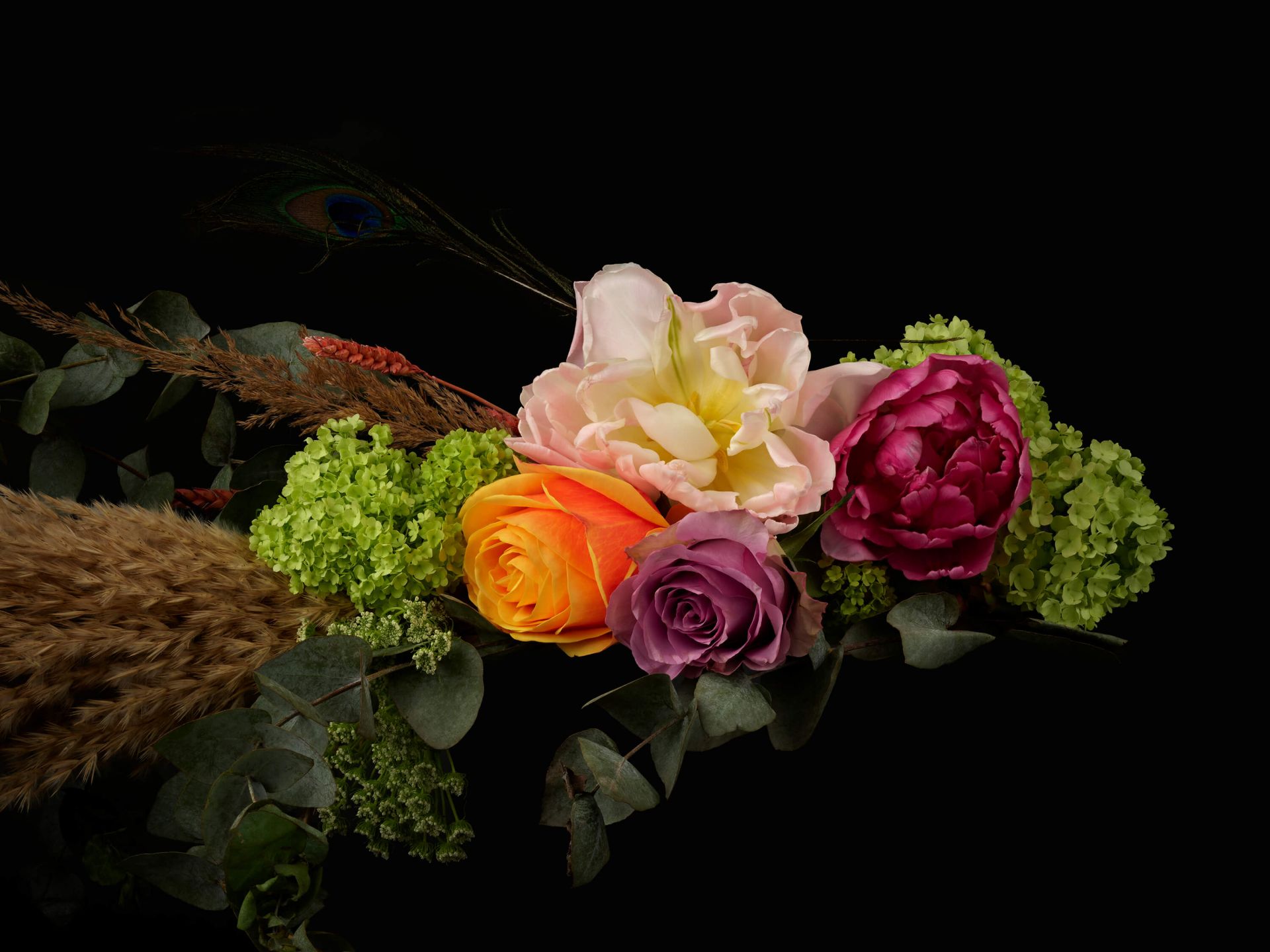 Blomsterkrans med fjer