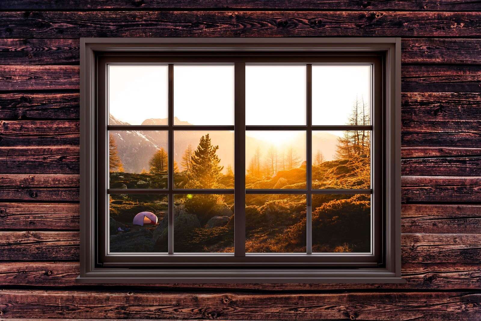 Solopgang i bjergdal