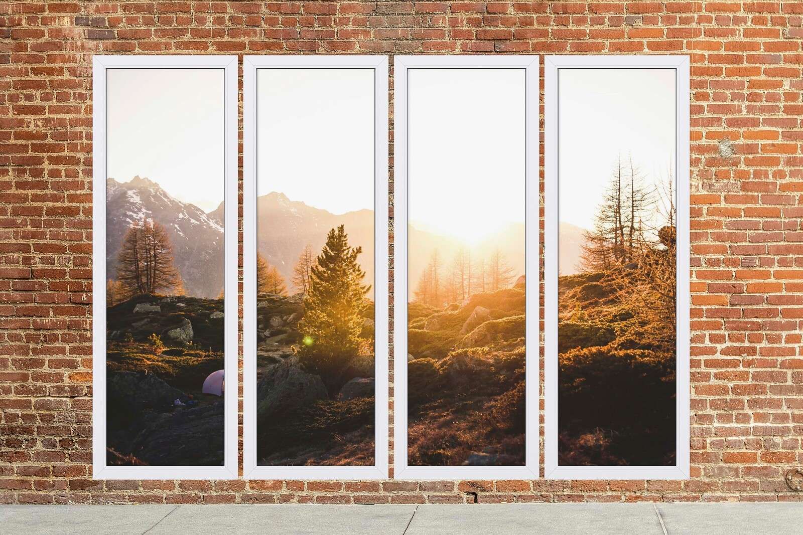 Soloppgang i alpelandskap